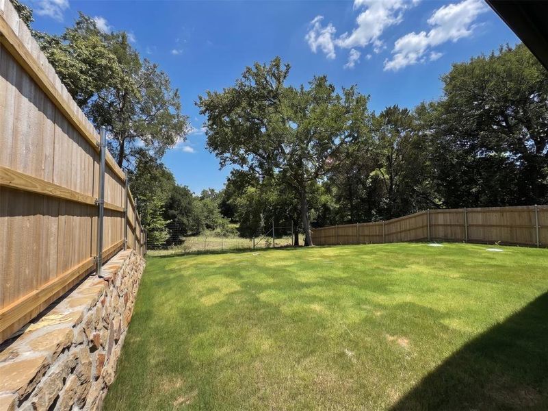 Exterior details and patio area of a home in , Granbury (Image 25). Exterior details and patio area of a home in , Granbury (Image 25).