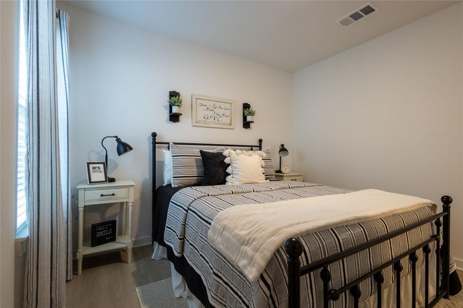 Furnished interior view inside a new home in Pinewood at Grand Texas, New Caney (Image 37).