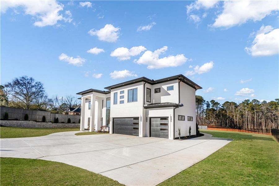 Front exterior of a new home in , Lawrenceville, GA, highlighting curb appeal (Image 30).