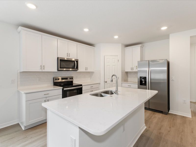 Kitchen in the Daphne floorplan at 2343 White Tail Street