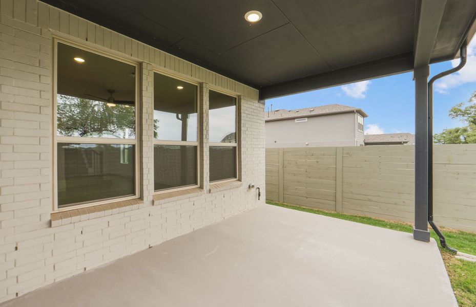 Exterior details and patio area of a home in Wolf Ranch, Georgetown (Image 30). Exterior details and patio area of a home in Wolf Ranch, Georgetown (Image 30).