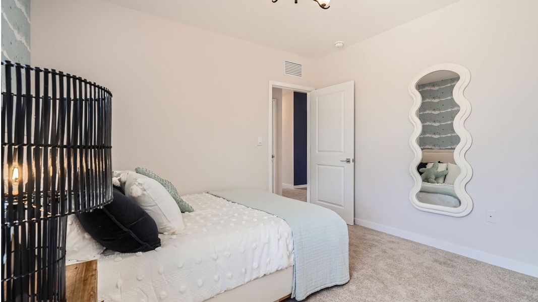 Representative furnished interior of a home built from the Grandcourt by D.R. Horton in Parker Pointe, Homestead (Image 23).
