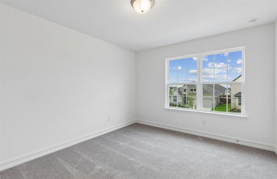 Secondary bedroom with large window Secondary bedroom with large window