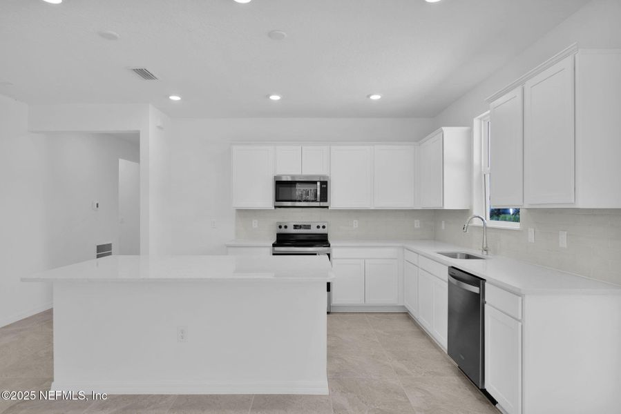 Furnished interior view inside a new home in Hyland Trail, Green Cove Springs (Image 5). Furnished interior view inside a new home in Hyland Trail, Green Cove Springs (Image 5).