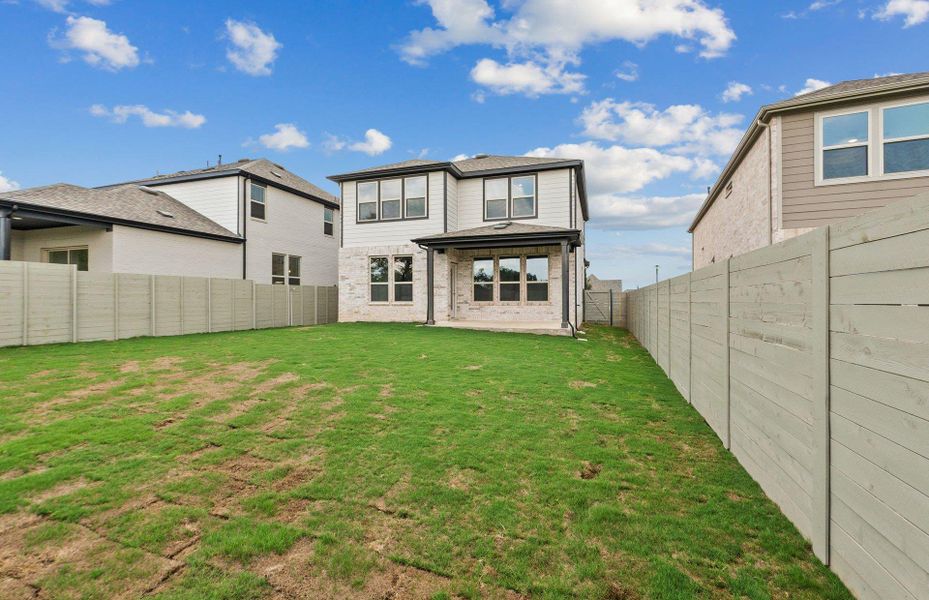 Exterior details and patio area of a home in Wolf Ranch, Georgetown (Image 22).