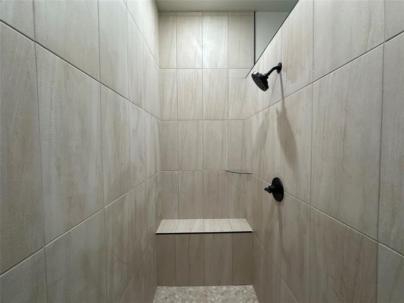 Bathroom view of tiled shower
