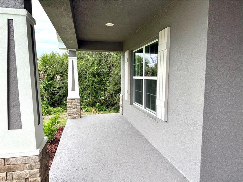 Front exterior of a new home in South Gulf Cove, Port Charlotte, FL, highlighting curb appeal (Image 17).