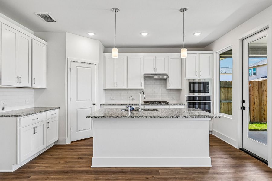 Furnished interior view inside a new home in Freedom at Anthem, Kyle (Image 3).