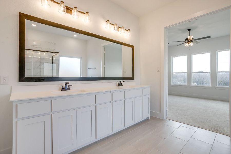 Representative furnished interior of a home built from the Valera by Graham Hart Home Builder in Bear Ridge, Burleson (Image 8).