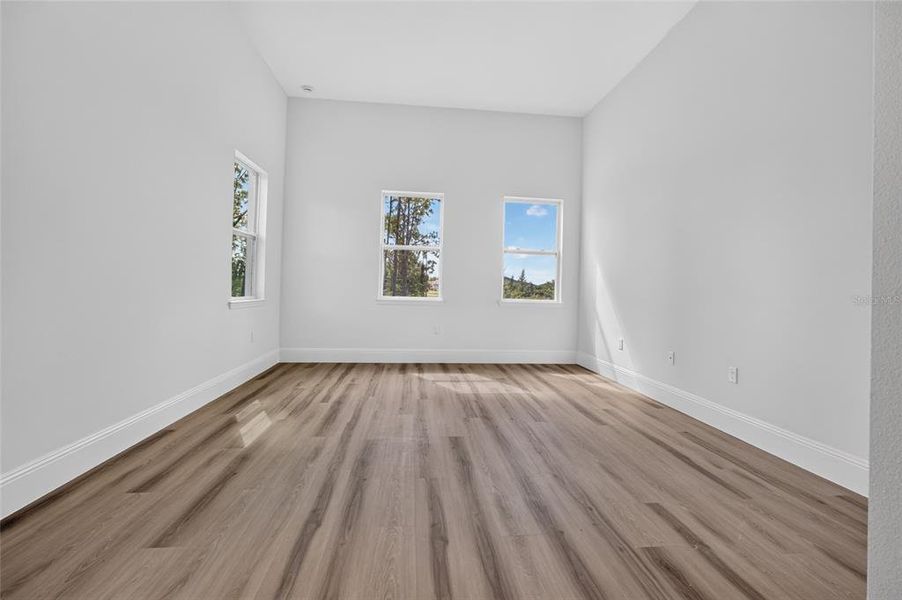 Spacious, unfurnished interior of a new home in , Port Charlotte (Image 52).