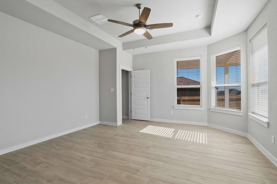 Representative unfurnished interior of a home built from the Cooper by Chesmar Homes in Carillon, Boerne (Image 8).