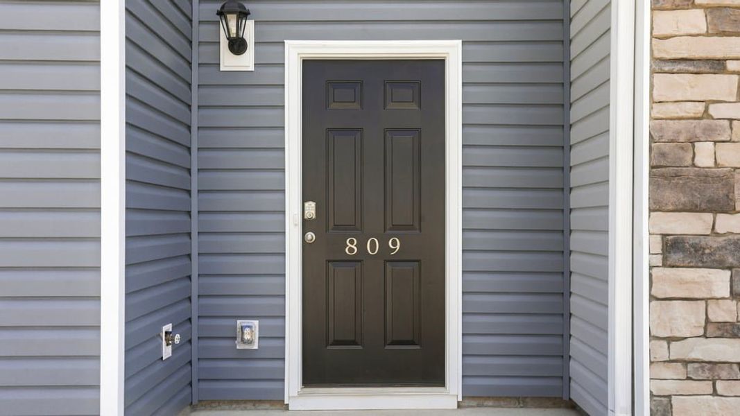 Exterior details and patio area of a home in Covington Village, Greer (Image 3).