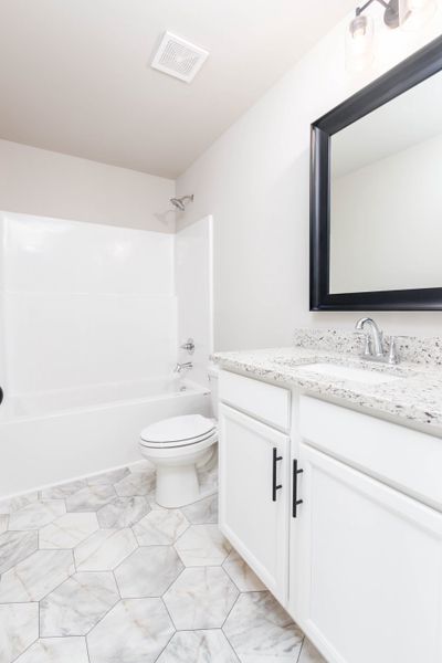 Representative furnished interior of a home built from the Cypress w/ Bonus Rm by Nason Homes in Woodland Farms, Dickson (Image 15).