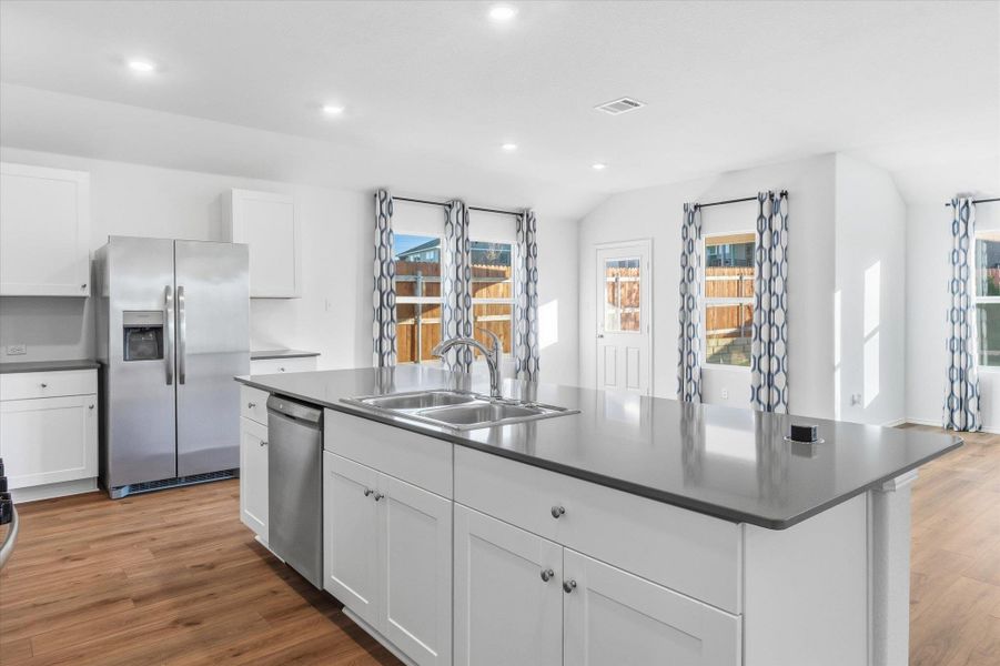 Furnished interior view inside a new home in Thunder Rock: Watermill Collection, Marble Falls (Image 13).