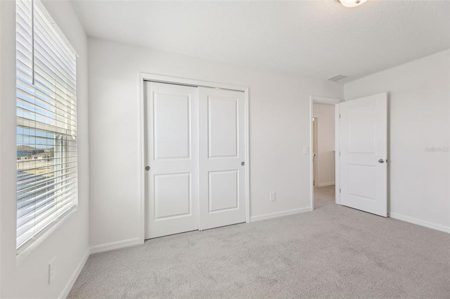 Spacious, unfurnished interior of a new home in Crosswinds - Signature Series, Haines City (Image 39).