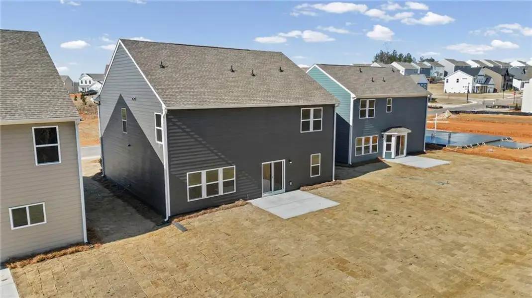 Exterior details and patio area of a home in Twin Lakes, Hoschton (Image 3).