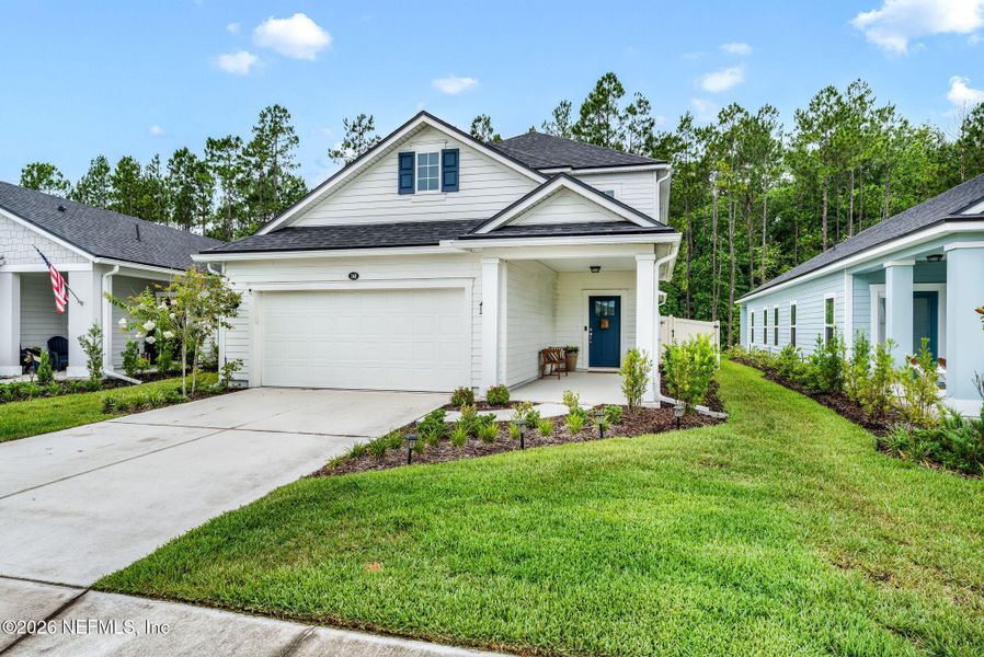 Front exterior of a new home in , St. Augustine, FL, highlighting curb appeal (Image 24).