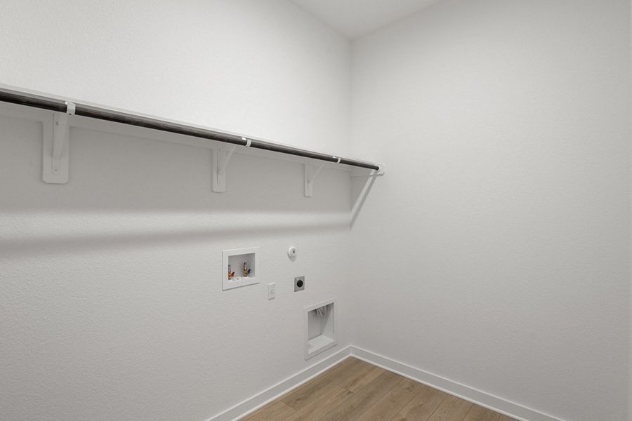 Spacious, unfurnished interior of a new home in Capitol Collection at Lariat, Liberty Hill (Image 44).