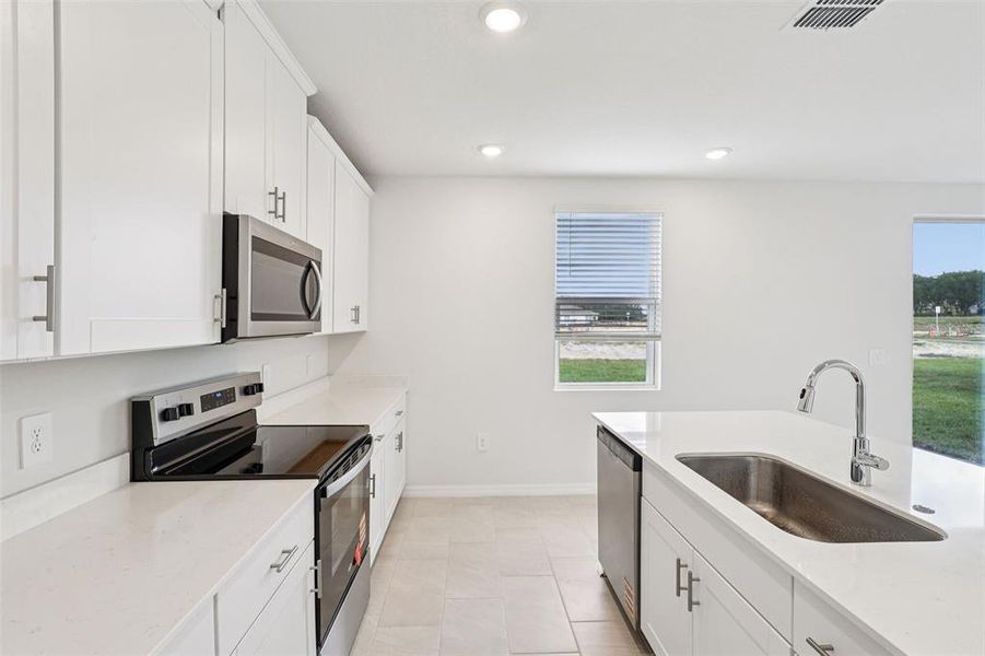 Furnished interior view inside a new home in , Davenport (Image 6).