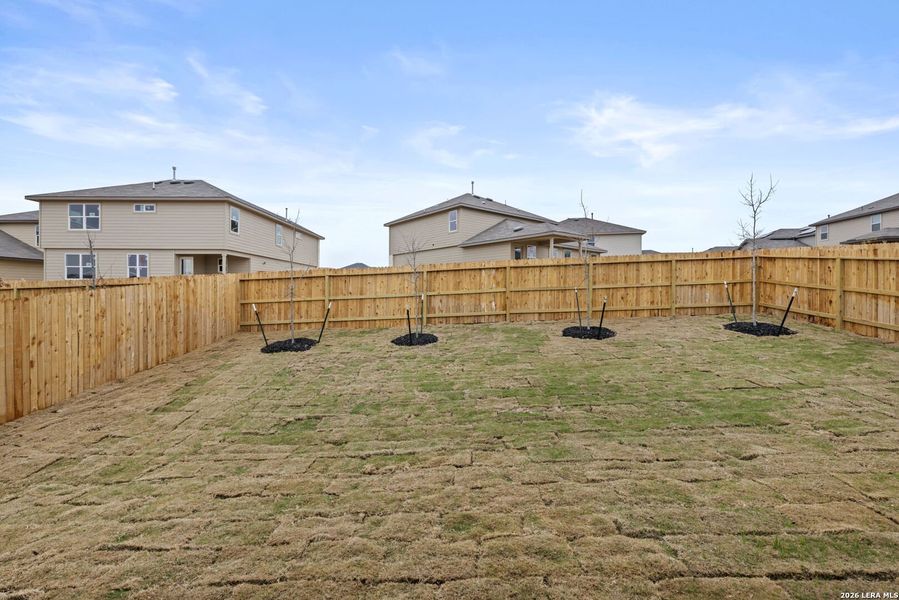 Exterior details and patio area of a home in Redbird Ranch, San Antonio (Image 2).