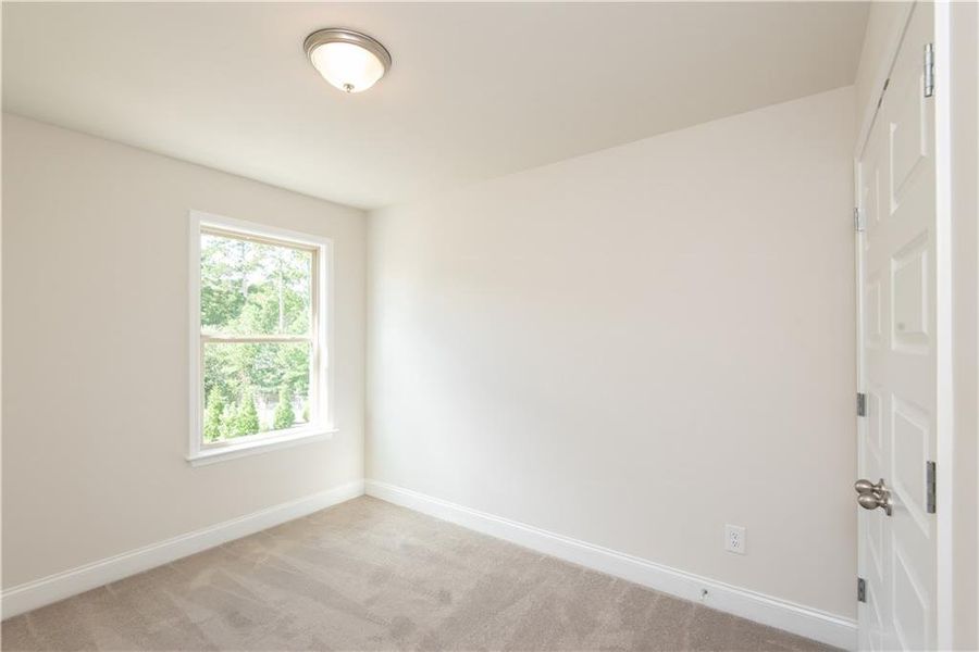 Spacious, unfurnished interior of a new home in Towns at Enclave, Lawrenceville (Image 10).