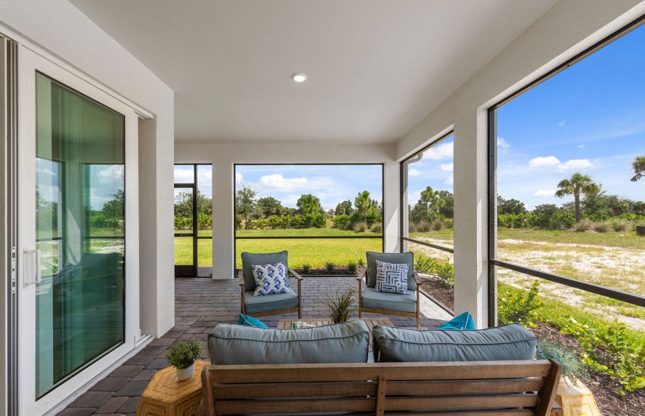 Exterior details and patio area of a home in TerraWalk at Babcock Ranch, Alva (Image 2). Exterior details and patio area of a home in TerraWalk at Babcock Ranch, Alva (Image 2).