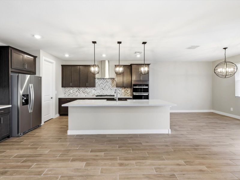 Furnished interior view inside a new home in White Tank Foothills Signature Series, Waddell (Image 3).