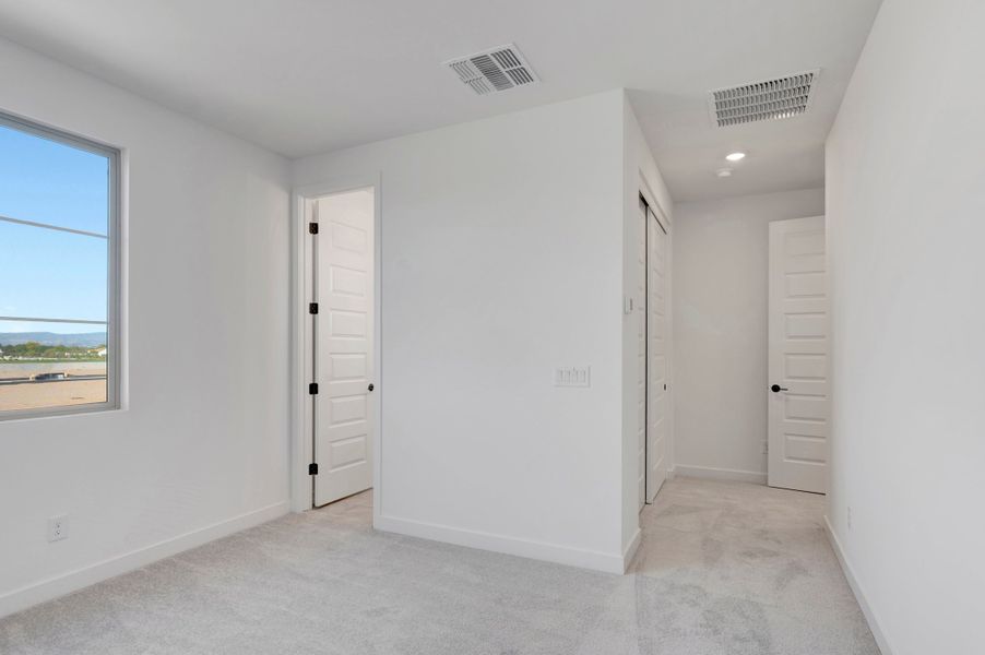 Spacious, unfurnished interior of a new home in Soleo, San Tan Valley (Image 26).