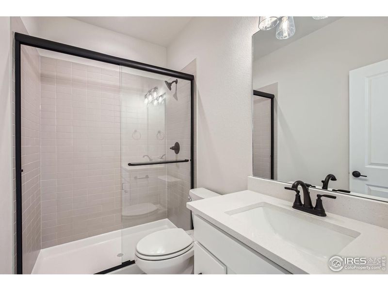 Furnished interior view inside a new home in RainDance, Windsor (Image 14).