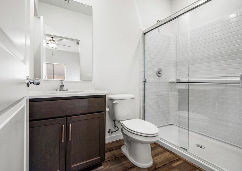 The master bedroom has a spacious walk in shower.