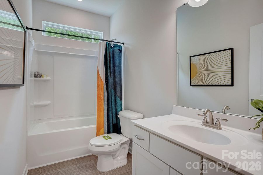 Furnished interior view inside a new home in Country Club Village, Salisbury (Image 18).