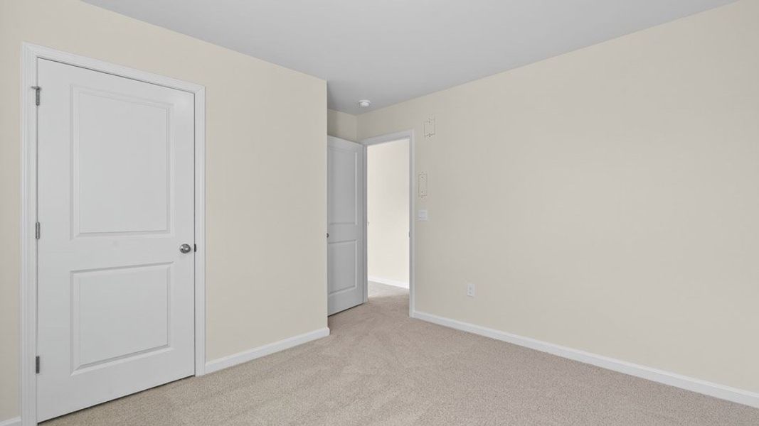Spacious, unfurnished interior of a new home in Honeycutt Oaks, Angier (Image 27).