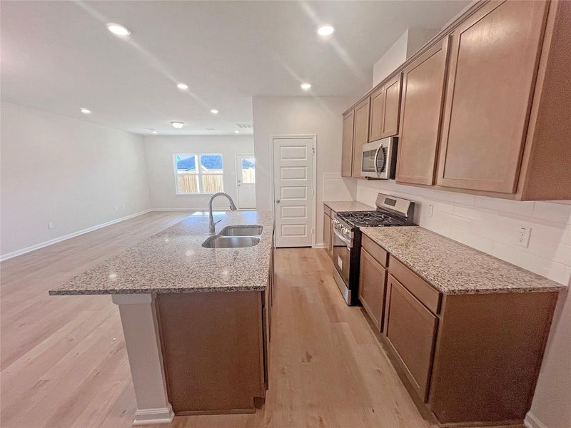 The Robin II- Kitchen. Sample image to be used for example only, colors, options and upgrades vary.