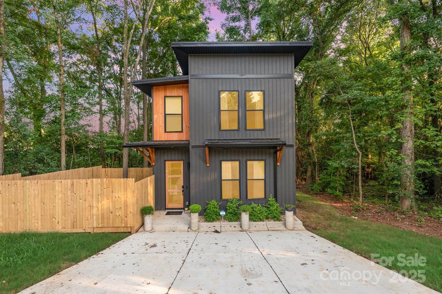 Front exterior of a new home in , Charlotte, NC, highlighting curb appeal (Image 16).