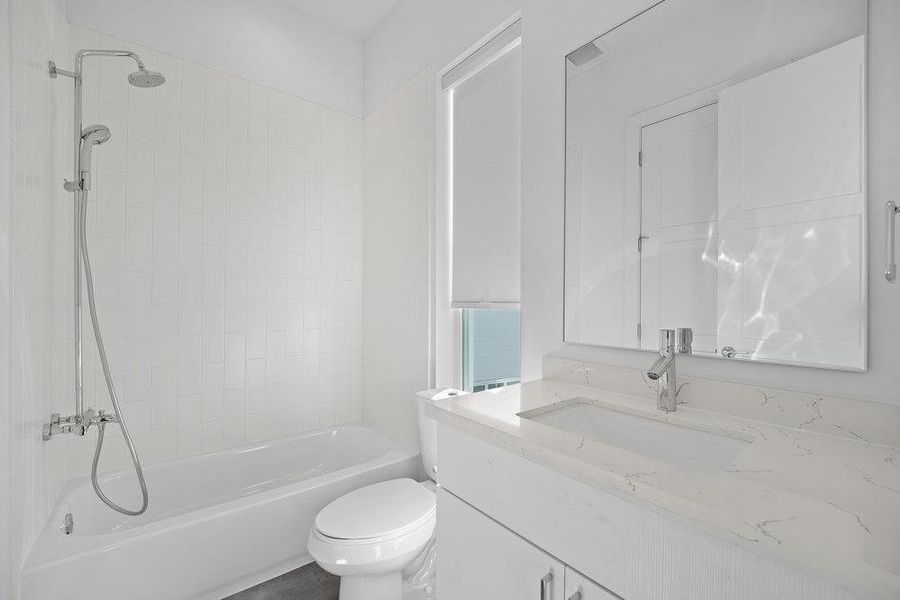 Bathroom with vanity and bathtub / shower combination Bathroom with vanity and bathtub / shower combination