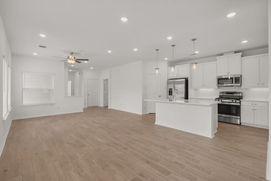 Representative unfurnished interior of a home built from the Chalet by Chesmar Homes in Woodforest, Montgomery (Image 6).