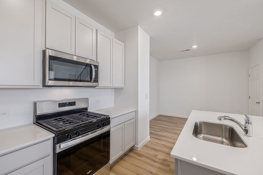 Furnished interior view inside a new home in Painted Prairie, Aurora (Image 10).