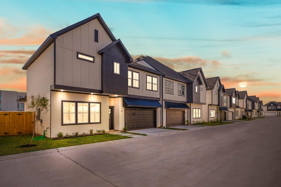Front exterior of a new home in Metro Village, Houston, TX, highlighting curb appeal (Image 18).