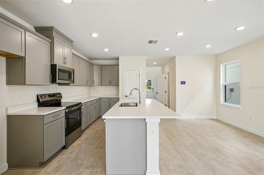 Furnished interior view inside a new home in Grasslands West, Lakeland (Image 9).