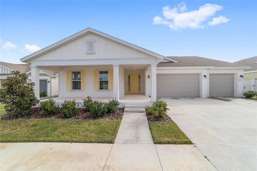 Front exterior of a new home in Calesa Township, Ocala, FL, highlighting curb appeal (Image 2).