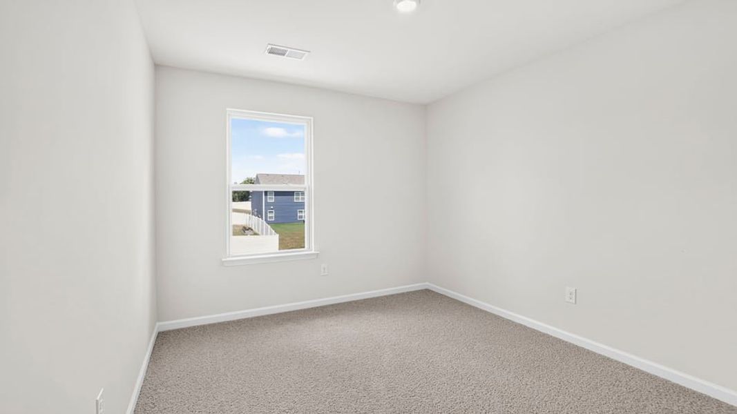 Spacious, unfurnished interior of a new home in Bentley Park, Greenwood (Image 26).