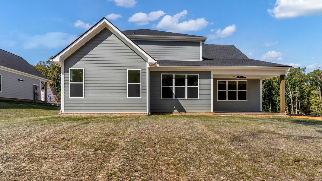 Exterior details and patio area of a home in Brush Creek, Fairview (Image 23).