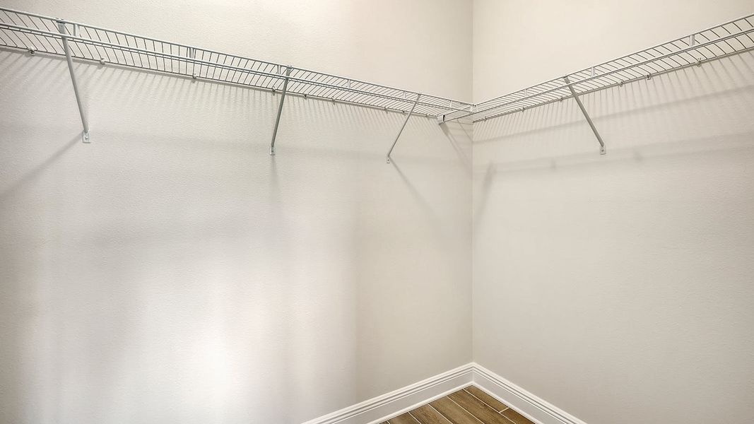 Spacious, unfurnished interior of a new home in Canoe Creek Real Estate and Homes for Sale in Parrish, FL - Neal Communities, Parrish (Image 63).