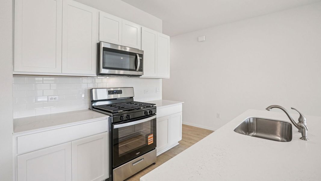 Furnished interior view inside a new home in Carillon, Manor (Image 7).