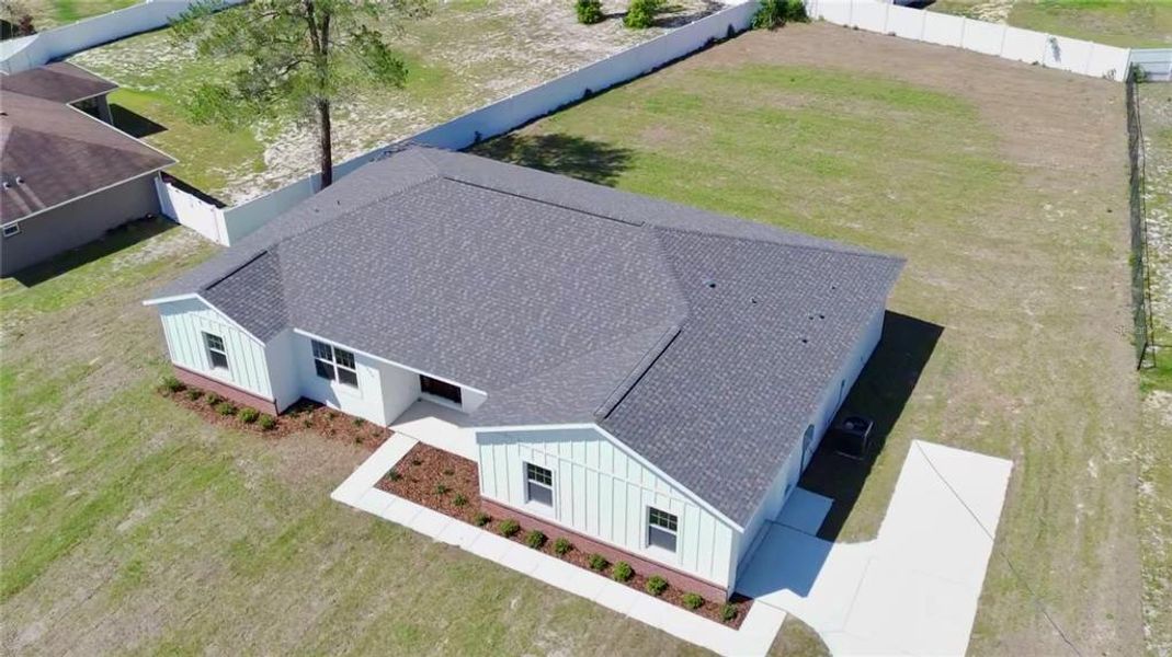 Front exterior of a new home in , Ocala, FL, highlighting curb appeal (Image 27).
