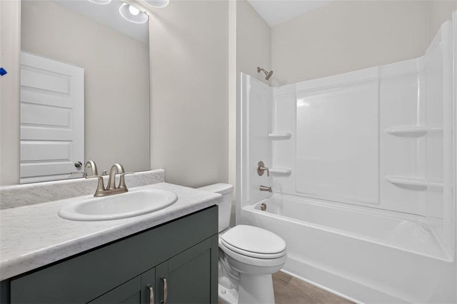 Furnished interior view inside a new home in Summerfield Place, Carrollton (Image 10).