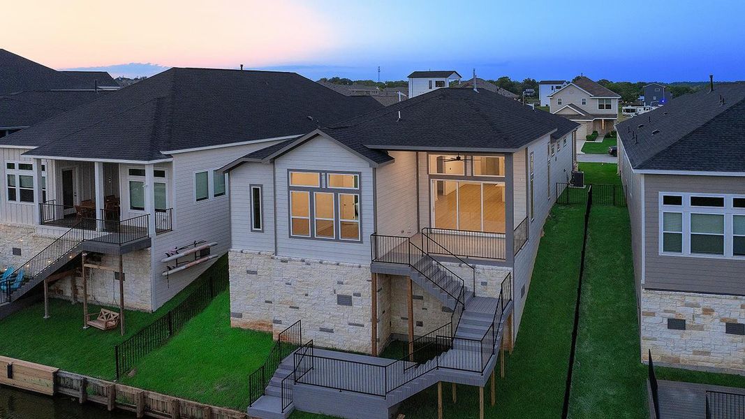 Exterior details and patio area of a home in Lake Breeze, Willis (Image 30).
