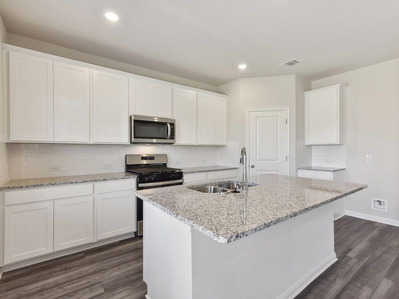 Cook your favorite meal in this beautiful kitchen.