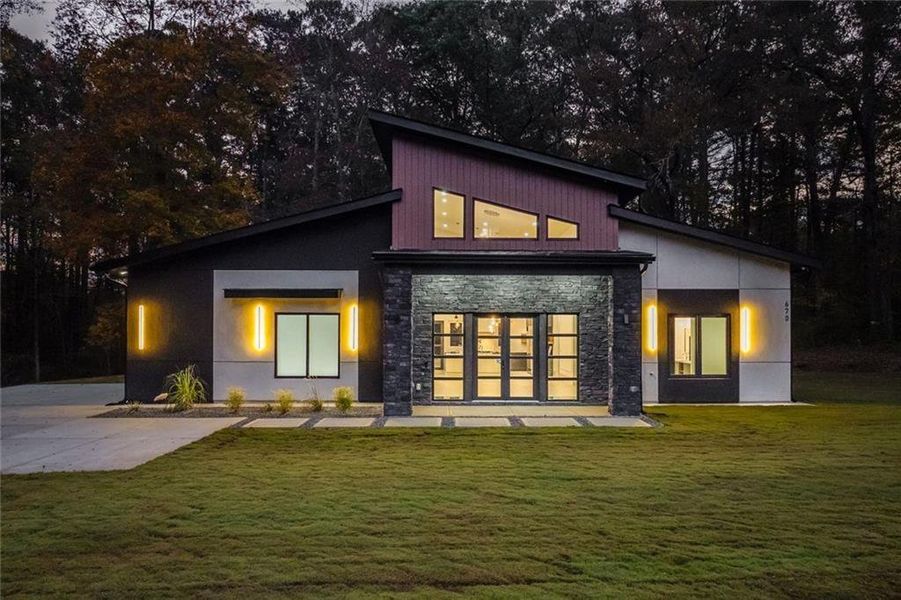 Front exterior of a new home in , Winder, GA, highlighting curb appeal (Image 27). Front exterior of a new home in , Winder, GA, highlighting curb appeal (Image 27).