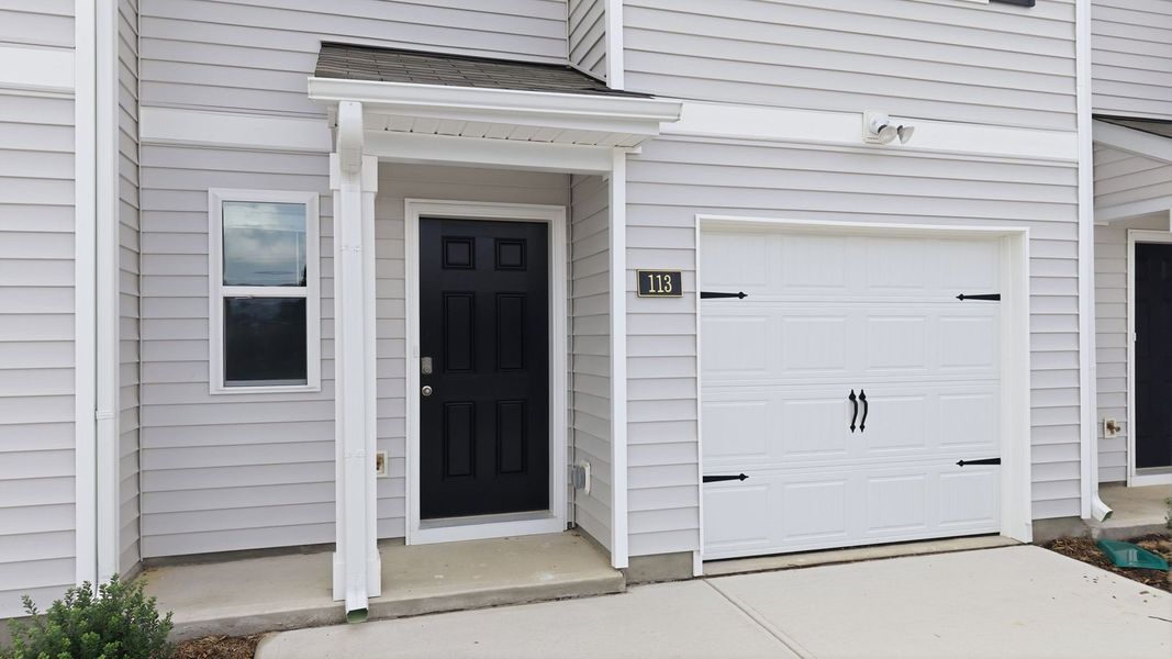 Exterior details and patio area of a home in The Townes at Hunter Hill, Rocky Mount (Image 3). Exterior details and patio area of a home in The Townes at Hunter Hill, Rocky Mount (Image 3).